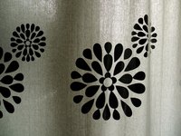Embellish plain curtains with a painted design.