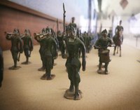 These toy soldiers are wearing garrison hats.