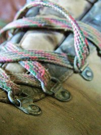 Shoe laces commonly experience wear over time and may ned to be replaced and re-laced.