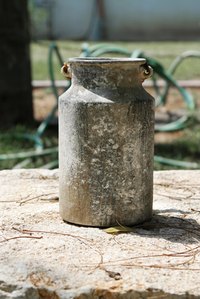 Transform a vintage milk can into artwork.