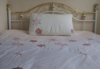 A pillow sham can make a pretty window valance.