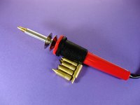 Soldering irons do not produce enough heat to melt silver solder.