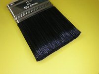 You can stir the paint with a brush as you mix in black to tint your blue.