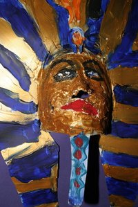 Create a mummy sarcophagus with cardboard and paints.