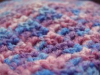 You can crochet a rug with Red Heart yarn.