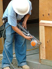 A nail gun drives nails efficiently.