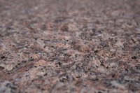 Dremel manufactures a number of small tools for lightweight stone cutting.