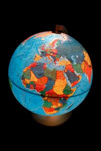 Creating a globe with cut-out continents can make learning fun for kids.