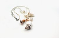 Assorted shells are used to make unique jewelry.