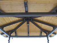 Treat wooden beams with stain and varnish to preserve their condition.
