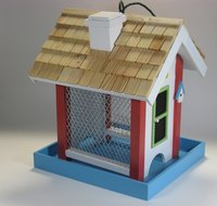 Pine wood shingles add to the look of a plain bird house.