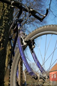 Turn an old bike wheel into your wheel of chance.