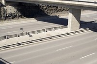Stopping in a travel lane is illegal.