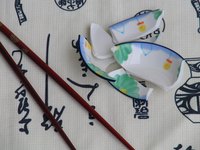 Polish broken china for craft projects.