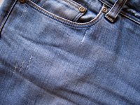 Customize a pair of denim jeans with an iron-on transfer.