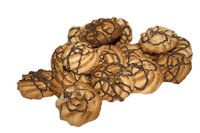 Melted chocolate chips drizzled on cookies add flavor.
