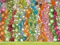 Use a barrel clasp to secure necklaces when performing bead work.