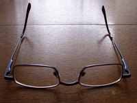 Use the appropriate solvent to clean paint from glasses.