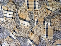 Fold fabric squares to make a pinecone.