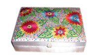 A fabric-covered wooden box can hold your knitting supplies or personal treasures.