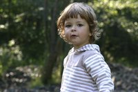 Earn money providing care for children by operating a daycare from your home.