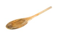 Use a large wooden spoon to transfer ink from paper.