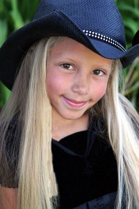 Simple decorations work for a casual or understated look on this cowgirl hat.