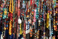 The sliding knot is a good way to finish necklaces without a clasp.