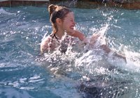 Word your pool party invitations so that guests know to bring swimsuits and towels.
