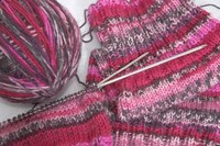 In loom knitting, a loom replaces the knitting needles.