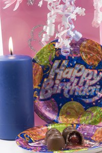 Games for a 90th birthday party can include badminton and bingo.
