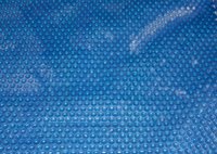 The bubbles on a solar cover should always face downwards.
