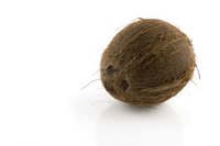 Use a cocunut for crafts, or do crafts depicting coconuts and coconut trees.