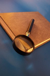 Every good pretend detective needs a clue notebook and a magnifying glass.