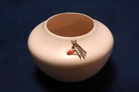 Engrave rough ceramic to turn a plain object into something special.