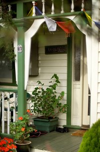 An enclosed front porch makes an ideal entryway and mudroom.