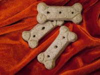 Dog bone cookies can be used at a dog-themed party.
