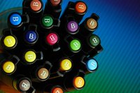 Copic markers come in a variety of colors and will not wash away.