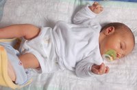 Use a baby papoose sling to hold your baby close and your hands free.