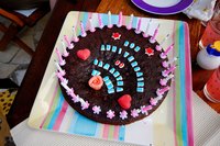 A cake with a graduation and birthday message will acknowledge both special events.