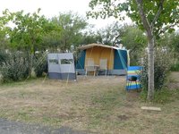 Adding an awning to a tent provides protection from rain or heavy sun near the door.
