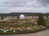 The colorful gardens at Versailles use many different types of plants and flowers.