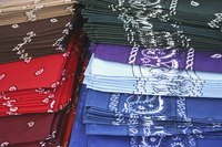 Bandanas in three different colors form this necklace.