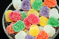 Place real gumdrops in clear glass containers for guests to nibble on.