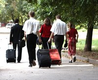 Fabric luggage can easily become torn by rubbing on the ground while traveling.