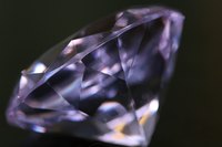 Glassy-looking diamonds form nearly 100 miles beneath the Earth's surface.