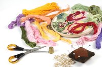 Don't let the hoop win; get the creases out of your cross-stitched work before displaying it.