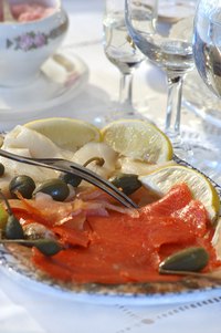 A salt water brine gives smoked salmon its distinctive salty flavor. Offset this saltiness for a milder taste.