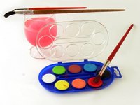 Artist's paints and brushes.