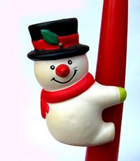 Make a snowman's top hat out of newspaper and black spray paint.